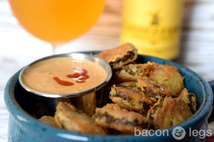 Beer-soaked dills, battered and fried, then served with a spicy satay sauce.